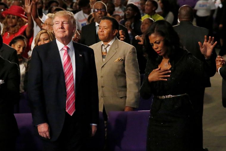 republican-presidential-nominee-donald-trump-and-omarosa-manigault-the-american-reality-game-show-personality-in-church-in-detroit