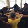 ‘Act of love’ amid violence: 6-year-old boy asks police officers to pray with him for their safety