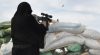 Mysterious Veiled Woman With A Pistol Strikes Fear In Heart of ISIS As She Goes On Killing Spree